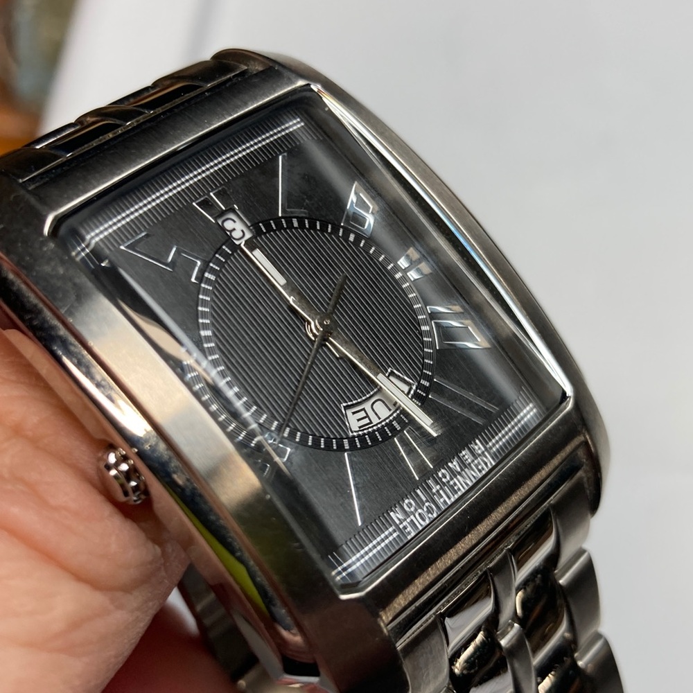 Kenneth Cole Reaction tank watch, stainless, black dial, new battery